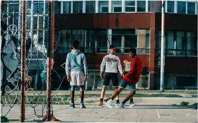 Youths playing basketball
